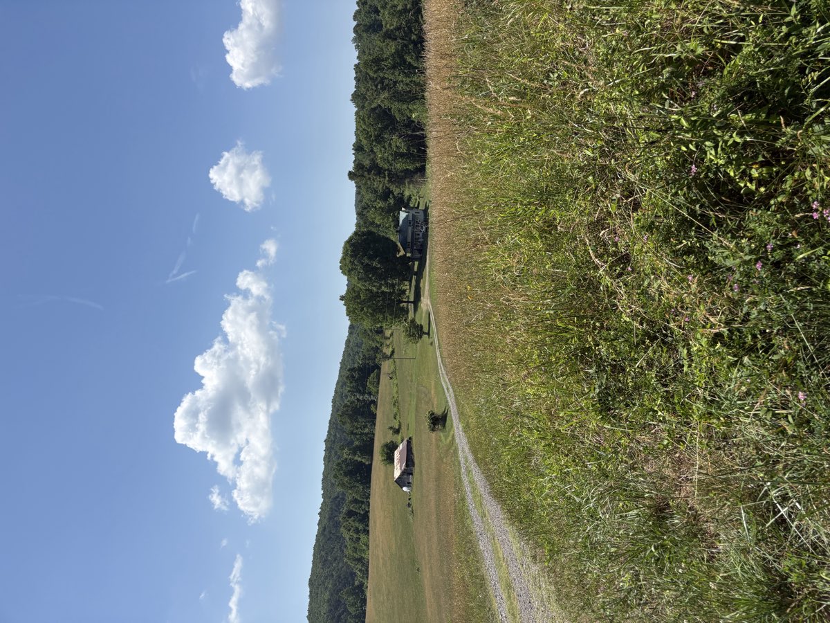 Follow the state road down through the fields